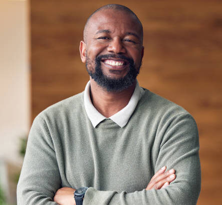 Business, confidence and portrait black man with smile in office, startup ceo or owner at hr company. Happiness, project management and happy, confident professional businessman at recruitment agency